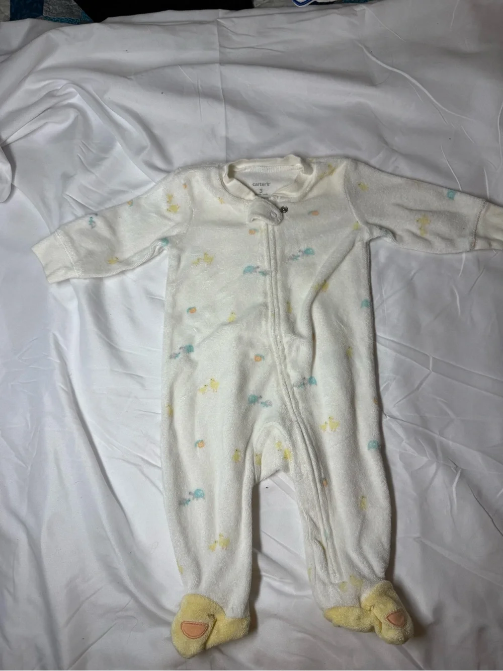 Carter's White Plush Footed One-Piece with Pastel Yellow & Blue Accents
